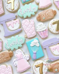 some decorated cookies are laying on a table