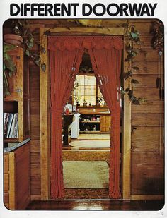 an open door leading into a room with wooden walls and wood paneling on the wall