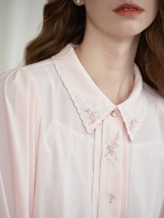 All 'Final Sale' items are excluded from any additional discounts and are not eligible for exchanges or refunds    Color Pink    Detail Color embroidery is integrated into the body, superimposed with a small amount of puff sleeves to improve the head-to-shoulder ratio; the small A-line loose version retains a comfortable space; the characteristic placket is pleated to add a sense of hierarchy; the preferred elastic chiffon fabric is soft to the touch and silky texture    Composition 95% polyeste