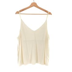 Abound Nordstrom Stretch Knit Spaghetti Strap Cream Tank Top V-Neck Trendy V-neck Tank Top For Loungewear, Chic V-neck Rayon Tank Top, Seamless V-neck Tank Top For Day Out, Summer V-neck Camisole For Loungewear, Casual Seamless V-neck Camisole, Beige V-neck Top For Summer, Summer V-neck Camisole For Vacation, Chic Viscose V-neck Tank Top, Trendy V-neck Camisole For Vacation