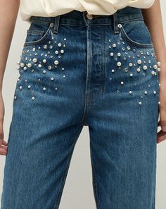 The Daniela you know and love—now with pearl and rhinestone embellishments. Made in LA from premium Italian denim, the high-rise, straight-leg jean features a snatched waist, a smooth, flat stomach and an ankle crop. The versatile length works well with flats and heels alike.Part of our capsule collection in collaboration with model, actress and entrepreneur Poppy Delevingne.100% CottonMade in USA from premium Italian denimTurn inside out and machine wash cold. Hang to dry.Style #J24109380079SY Snatched Waist, Designer Jeans For Women, Poppy Delevingne, Kick Flare Jeans, Leather Pant, Classic Jacket, Embellished Jeans, Rhinestone Embellishments, Flat Stomach