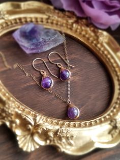 Delicate and cute Amethyst jewelry set with earrings and necklace. Petite and dainty jewelry set to wear every day ✨• Stone size: 6mm• Pendant size: 1 x 0.7 cm• Earrings drop length: 2 cm✨ Amethyst is an all-around healing and protection stone. It is a natural tranquilizer that helps to relieve stress and strain, alleviates sadness and grief. Amethyst is a soothing and calming stone that helps to dissolve negativity and also provides protection ✨• 14K gold-filled & 925 Sterling Silver are known Spiritual Gemstone Jewelry Sets For Gifts, Purple Jewelry Sets With Matching Earrings For Gift, Dainty Necklace With Matching Earrings For Gift, Dainty Necklaces With Matching Earrings For Gifts, Handmade Purple Jewelry Sets As Gift, Delicate Jewelry Sets With Matching Earrings As Gift, Dainty Purple Jewelry With Matching Earrings, Delicate Amethyst Jewelry For Gifts, Dainty Jewelry Sets With Matching Earrings As Gift