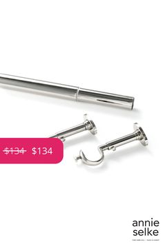 two stainless steel hooks are shown with the price tag for each item in front of them