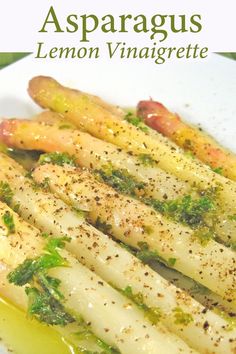 asparagus and lemon vinaigrette on a white plate with the title above it