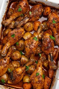 roasted chicken and potatoes in a baking dish