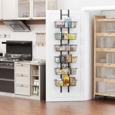 a kitchen filled with lots of different types of food in baskets hanging on the wall