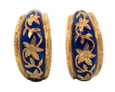 These beautiful 1950s Retro Floral Huggie Hoop Earrings are crafted from rich 18k Yellow Gold, White Gold, and Enamel. They have White Gold hinges The face of the earring shines with Cobalt Blue Enamel and a shining 18k Gold Floral Design. They have Hinged Lever Omega post Backs with a gentle grip texture. These stunning earrings measure 20 millimeters long x 10 millimeters wide. Rich, bold and feminine! These earrings will add a special touch to any look! This piece shows that high quality craf 1950s Retro, Pearl Cluster, Earrings Hoop, Stunning Earrings, Huggie Hoop Earrings, Retro Floral, Jewelry Earrings Hoops, Gold Hoop, Gold Hoop Earrings