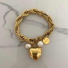 🔅this is an impressive statement bracelet . it is made of chunky steel snake  chain . it has a large size thickness aprox 1 cm .  bracelet is decorated with a puff heart charm and fresh pearls .  available in two sizes  s-m aprox 19 cm ( most common choice )  l-xl aprox 21 cm  if you need any other measurements, pls let me know .  pls note this bracelet has a chunky large look .  you may also check my collection to find it's matching necklace!  ⚜️Everything is taking place in a private clean or Chunky Stainless Steel Jewelry For Gifts, Chunky Stainless Steel Jewelry Gift, Everyday Metal Chain Bracelet With Heart Charm, Heart Bracelet Gold, Jewelry Heart, Snake Chain Bracelets, Puffed Heart, Puffy Heart, Statement Bracelet