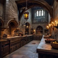 a large kitchen with stone walls and an arched doorway leading to another room that has lots of counter space