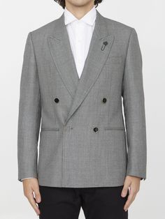 Double-breasted jacket in grey wool. It features peaked lapels, front four-button closure, two front welt pockets, a welt pocket on chest and buttoned cuffs. Regular fit. The model is 184cm tall and wears size IT 48.Size nationality: IT Product number: 37176789 Product code: 690661571901 Composition: 100% WOOL Gray Sport Coat With Suit Collar For Formal Occasions, Formal Gray Sport Coat With Suit Collar, Double-breasted Tuxedo With Hidden Button Closure For Work, Tailored Gray Blazer, Classic Double Breasted Suit For Fall, Classic Double Breasted Suit For Fall With Hidden Buttons, Gray Notch Lapel Sport Coat For Formal Occasions, Gray Single Breasted Suit For Workwear, Tailored Pea Coat With Suit Collar And Buttons