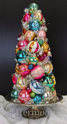 a colorful christmas tree with ornaments on it