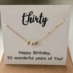 This necklaces celebrates 30 year Birthday! Made from 14k gold fill. Cute little 14k gold fill, Sterling silver, 14k rose gold fill beads hang on a 14k gold fill chain. Comes ready for gift giving in an organza bag, or gift box for $1 Dainty Necklace With Hallmark For Birthday, Dainty Rose Gold Necklace For Birthday, Dainty Rose Gold Charm Necklace For Birthday, Year Necklace, Birthday Necklace, 30 Years Old, Wedding Jewellery Necklace, Gold Filled Chain, Wedding Necklace