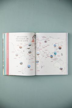 an open book showing the locations of people around the world