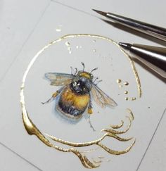 a drawing of a bee on top of a white plate with gold trimmings