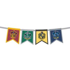 harry potter pennants are hanging on a line with the hog potter crest and sly's house