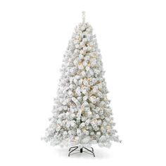 a white christmas tree with lights and snow on the top, against a white background