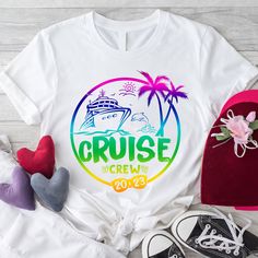 the cruise crew shirt is on display next to other items