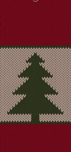 a knitted christmas tree pattern on a red and white sweater with green trees in the middle