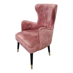 an upholstered pink chair with black legs and gold trimmings on the arms