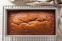 a loaf of banana bread on a cooling rack