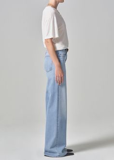 The Loli features an ultra-flattering mid-rise waist that sits higher up on the hip with an easy, relaxed wide leg. The 32" inseam lengthen the leg for a look that can be easily dressed up or down. This fit is true to size. Looks Like: Light indigo with fading and finished hems Feels Like: Signature soft stretch denim designed to hold its shape all-day From our HUMANITY Collection Relaxed High Waist Wide Leg Pants For Spring, Relaxed Mid-rise Everyday Pants, Relaxed Fit Wide Leg Bottoms For Elevated Casual, Effortless Wide Leg Everyday Bottoms, Elevated Casual Relaxed Fit Wide Leg Bottoms, Everyday Denim Wide Leg Pants, Relaxed Wide Leg Everyday Bottoms, Mid-rise Wide Leg Pants For Spring, Relaxed Wide Leg Bottoms For Everyday