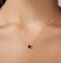 14K SOLID WHITE GOLD PRONG SETTING 6MM RUBY SOLITAIRE NECKLACE -July Birthstone- Here is a dainty, delicate and simple, yet classy minimalist Solitaire lab created Ruby Necklace. This is 14k Solid Gold. (We do not sell filled or plated jewelry) Perfect for everyday use.Necklace Length : 16 inches / 41.5cmPendant Width : 6mmTotal Carat: 0.60ct Simple Ruby Necklace Designs, Ruby Necklace Simple, Real Ruby Necklace, Star Wedding Band, Ruby Necklace Designs, Gold Ruby Necklace, Ruby And Diamond Necklace, Yellow Gold Solitaire, Solitaire Necklace