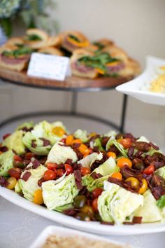 two plates filled with different types of food on top of a table next to each other