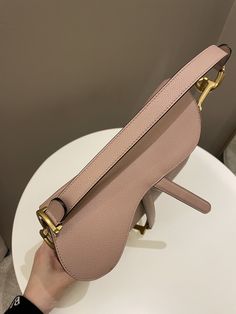 Dior Saddle BagNude Blush Grainy Leather AGHWSize 26 x 20 x 7 cmAdjustable strapYear 20229.7/10 Like New (minor flap edge faint mark, minimal sign of use otherwise like new)Includes dust bag and cardRTP 6400 sgdPrice now 4450 sgd  3260 usd CN5724-01 Dior Saddle, Bottega Veneta Shoulder Bag, Saddle Bag, Diaper Backpack, Exclusive Bag, Casual Backpack, New Bag, Dior Saddle Bag, Saddle Bags