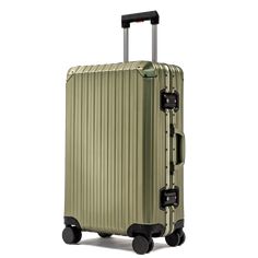 a green suitcase with wheels and handle on a white background in front of the camera