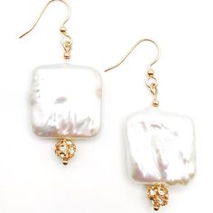 Stunning statement earrings featuring square baroque pearls and gold plated brass crystal beads. 2" dropFrench wire ear hooks Handmade in Lincoln, Nebraska Elegant Square Beaded Earrings, Rectangular White Jewelry With Pearl Drop, Square Gold Beaded Jewelry, Gold Square Beaded Jewelry, Gold Crystal Earrings With Pearl Charm, Lincoln Nebraska, French Wire, Ear Hook, Pearl Drop Earrings