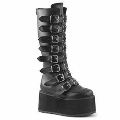 These Lace Me Up Platform Boots beature black vegan leather, 3.5 inch platform, knee boot, chrome plated buckle straps and full back zip for easier on/off #lacemeup #buckles #kneehighboots #platformboots #blackboots #blackboots Demonia Damned 318, Demonia Boots, Knee High Platform Boots, Goth Shoes, Goth Boots, Demonia Shoes, Dr Shoes, Light Up Shoes, Black Vegan