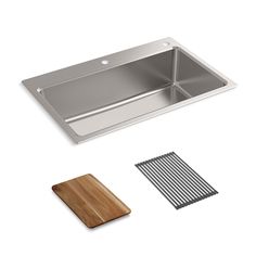 stainless steel kitchen sink with wooden cutting board and strainer set on white back ground