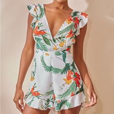 White Tropical Tie Back Romper, Never Worn, New And Super Cute! White Tropical Print Dress For Garden Party, White Dress With Tropical Print For Garden Party, White Tropical Dress For Spring, White Tropical Dress For Brunch, White Tropical Printed Dress, White Tropical Dress With Floral Print, Tropical White Printed Dress, White Summer Dress For Summer Parties, White Tropical Print Short Sleeve Dress