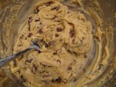 a mixing bowl filled with batter and chocolate chips