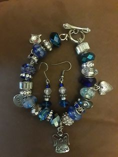 One of a kind Charm Bracelets by AmyBedazzled jewelry line. You can either buy them as is, or they can made to order by color (s) and by the type of charm (s) you want. They come in size small (7.5 inches), med (8 inches) and large (8.5 inches), and  X large (9 inches). Add some dazzle to your life! Attention Philly and South Jersey residents! To avoid shipping costs I can sell my jewelry face to face. Let me know the place and the time. Blue Heart Beads Jewelry For Friendship, Blue Jewelry With Dangling Charms For Jewelry Making, Silver Bracelet Jewelry For Gift Making, Handmade Blue Dangle Charm Bracelet, Blue Charm Bracelet With Dangling Charms As Gift, Blue Nickel-free Charm Bracelet As Gift, Nickel-free Blue Charm Bracelet For Gift, Nickel-free Blue Charm Bracelet Gift, Nickel-free Blue Dangle Bracelets