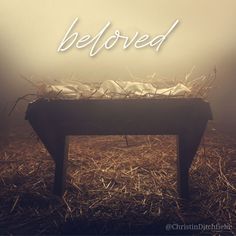 an image of a baby in a manger with the words beloved written above it