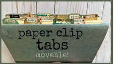 there is a sign that says paper clip tabs