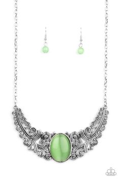 Featuring vine and floral details, leafy silver frames branch out from an oversized green cat's eye stone center, creating a dramatically whimsical centerpiece below the collar. Features an adjustable clasp closure. Sold as one individual necklace. Includes one pair of matching earrings. Whimsical Centerpiece, 3d Jewelry, Cats Eye Stone, Silver Frames, Paparazzi Accessories, Moonstone Necklace, Eye Stone, Green Necklace, Paparazzi Jewelry