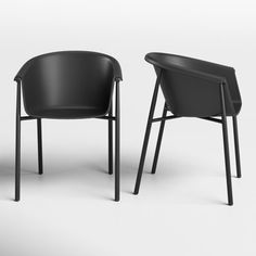 two black chairs sitting next to each other