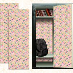 an open bookcase with a backpack on it and a floral wallpaper behind it