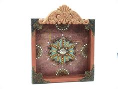 a decorative wooden box with an ornate design