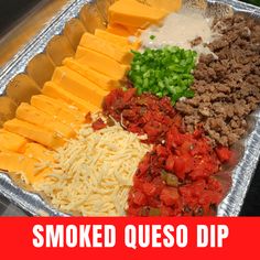 a tray filled with different types of cheese and meats next to the words smoked quesadilla dip