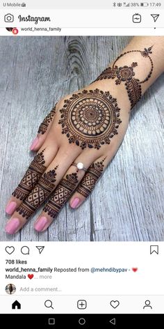 a woman's hand with henna tattoos on it, and the words instagramn