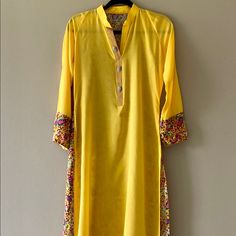 Beautiful Yellow Long Tunic With Stone Embellishments On Neck And Printed Back. Never Worn. Size Small. Dm For Measurements. #Desi #Pakistani #Tunic Yellow Kurta With Mirror Work For Party, Yellow Mirror Work Kurta For Party, Yellow Bohemian Kurta With Dupatta, Yellow Summer Kurta For Festive Occasions, Yellow Bohemian Kurta For Diwali, Yellow Fitted Bohemian Kurta, Fitted Yellow Bohemian Kurta, Yellow Bollywood Style Kurta For Summer, Yellow Kurta For Eid Party