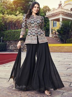 Black Readymade Bridal Wedding Palazzo Suit SFSR267814 Be at the top of the trend with this Georgette designer salwar kameez. Adorned with embroidery and sequins, this ensemble comes with a matching bottom. 100% Original Fabric - Georgette Work - Embroidery work Occasion: Ceremonial, Reception, Wedding Please Note : - For a fully customized selection, a measurement link will be sent to your Email. - Unstitched item estimated delivery time for the UK and worldwide is 1-2 Weeks. -Fully stitched item will be 2-3 weeks time on delivery from the time we receive your measurements Wedding Palazzo, Readymade Salwar Kameez, Resham Work, Latest Dress Design, Fancy Sarees Party Wear, Palazzo Suit, Stylish Short Dresses, Pakistani Fancy Dresses