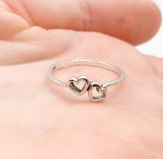 Sweet little sterling silver ring with two hearts joined!! Face height is 6mm. Available in size 6 only. - Genuine sterling silver - Size 6 only Stylish Jewelry Accessories, Silver Promise Rings, Two Hearts, Stylish Jewelry, Opal Rings, Promise Rings, Heart Ring, Sterling Silver Rings, Jewelry Accessories