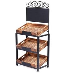 an iron and wood shelf with two trays