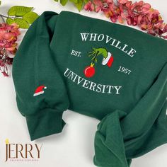 The Grinch Christmas Whoville University Embroidered Sweatshirt is the perfect way to showcase your festive spirit this holiday season. Made from high-quality materials, this sweatshirt features a beautifully embroidered design of the iconic Whoville University logo, adding a touch of whimsy to your wardrobe. With its comfortable fit and soft fabric, it offers both style and comfort. Whether you’re attending a holiday party or lounging at home, this sweatshirt will keep you cozy and in the Christmas Whoville, Whoville University, Christmas Crewneck, Embroidery Sweatshirt, Embroidered Crewneck, Grinch Christmas, Embroidered Sweater, Sweatshirt Christmas, Embroidered Sweatshirt