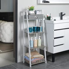 a bathroom with a white shelf next to a sink