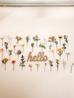 Flowers Flower Wall Birthday Party, Empty Frames On Wall Decor Ideas, Floating Flower Wall, Hanging Flower Wall Decor, Flowers On Wall, Fake Flower Wall, Townhome Decorating, Mothers Day Decor, Hello Sign